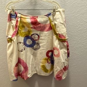 Anthropology feo print colored A-line skirt. Left side zipper